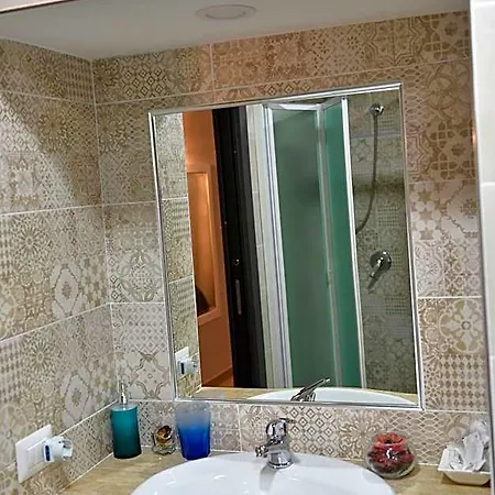 Famigi Acomodação com café da manhã  4*